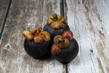 Pile of Mangosteen, Queen of tropical fruit with juicy and high vitamin. 