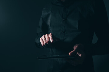 man holding tablet as a stand