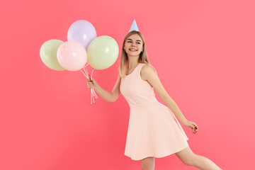 Concept of Happy Birthday with attractive girl on pink background