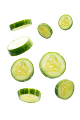 cucumber slices over on white background.