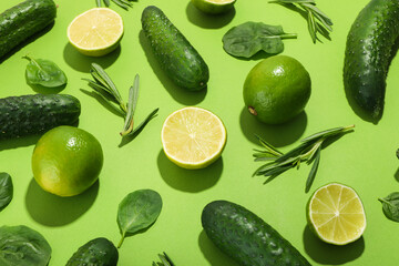 Flat lay with vegetables and fruits on green background