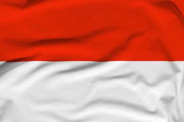 Indonesia national flag, folds and hard shadows on the canvas