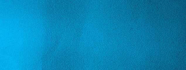 Turquoise painted textured wall. Panoramic light blue background and texture. For graphic design and banner