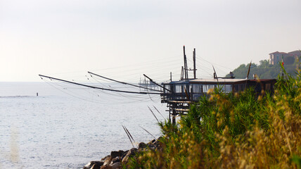 Coast of the Trabocchi, Trabocco in Marina di San Vito Chietino. The Trabocco is a traditional wooden fishing house on pilework, typical of Adriatic sea, coast of Abruzzo, Italy