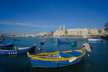 Molfetta, Puglia, Italy, view of the beautiful harbor with the typical colored boats.                           