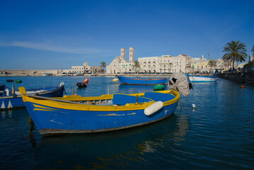 Molfetta, Puglia, Italy, view of the beautiful harbor with the typical colored boats.              ...