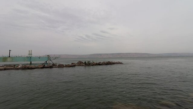 The Sea of Galilee is full of water to the end, after a particularly rainy winter - cloudy skies of winter - Tiberias