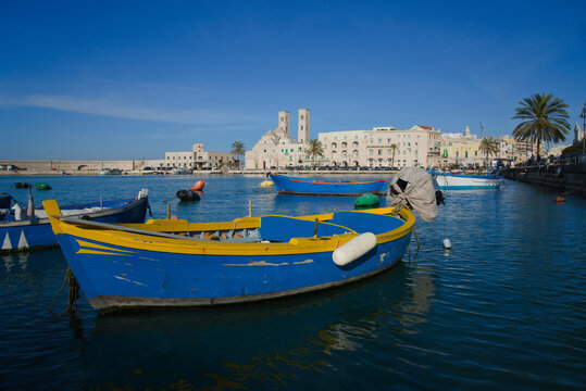 Molfetta, Puglia, Italy, view of the beautiful harbor with the typical colored boats.                           