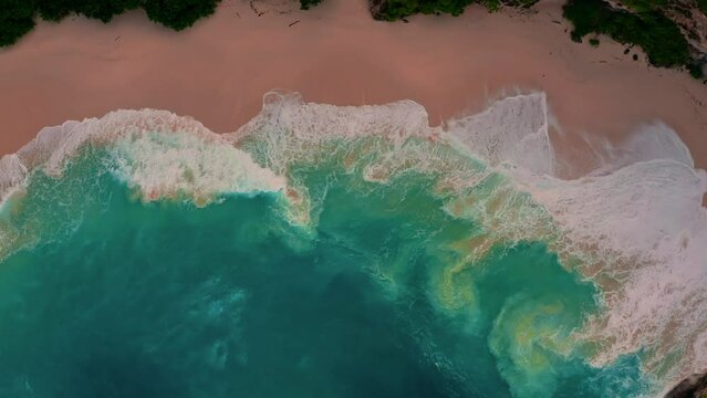 Aerial top view on coastline tropical beach with scenery waves crashed on tropical beach 4K