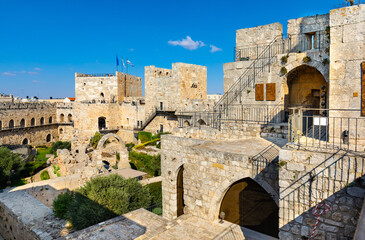 Naklejka premium Inner courtyard, walls and archeological excavation site of Tower Of David citadel stronghold in Jerusalem Old City in Israel