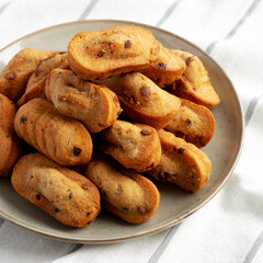 Homemade Chocolate Chips Madeleines on a Plate, low angle view.