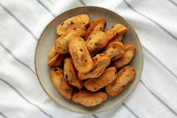 Homemade Chocolate Chips Madeleines on a Plate, top view. Flat lay, overhead, from above.