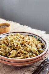Fried white cabbage with caraway seeds and curry powder