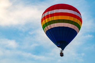 Naklejka premium Hot air balloons floating in the air over the City of Burlington, WI