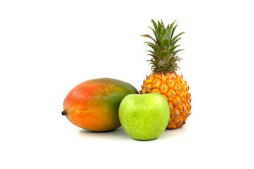 Mango, pineapple and apple isolated on a white
