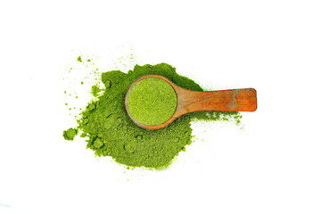 Young barley or wheat grass with wodden shovel, detox superfood, white background