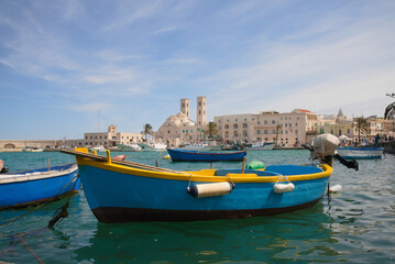 Molfetta, Puglia, Italy, view of the beautiful harbor with the typical colored boats.                           