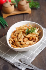 a plate of fried crispy fish on the table 