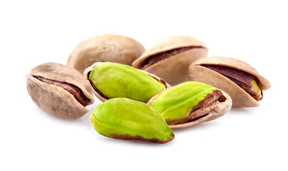 Salted Pistachio nuts in closeup isolated on white background.