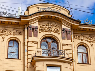 Fototapeta na wymiar St. Petersburg, Russia, May 9, 2022. Fragment of the facade of a building, in ​​historical part of the city. 