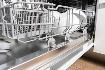 Full load dishwashing machine. Clean dishes and cutlery
