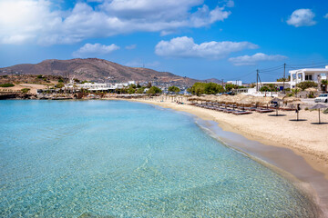 The popular beach at Agathopes, Syros island, Cyclades, Greece, with emerald sea and fine sand
