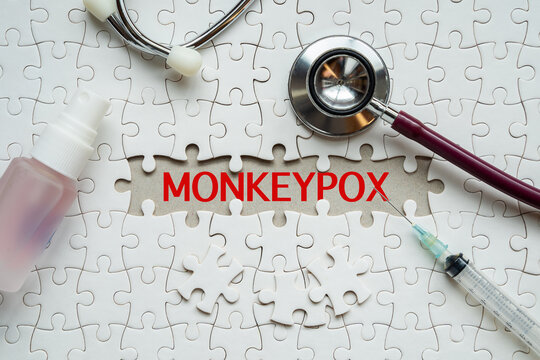 Puzzle with a word MONKEYPOX, Monkeypox new disease dangerous. Stop Monkey Pox virus outbreak pandemic