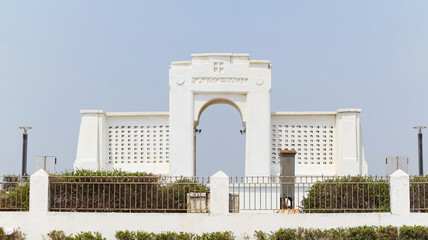 View of Karl Schmidt Memorial, Besant Nagar Beach, Chennai, Tamilnadu, India Commemorates an European sailor who drowned in 1930 trying to save the life of a girl. - obrazy, fototapety, plakaty