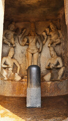 Sculpture of Lord Vishnu and Half Shivalinga in Trimurti Caves, Mahabalipuram, Tamilnadu, India