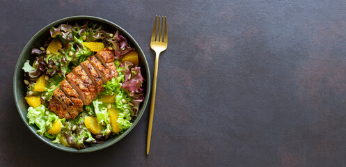 Salad with duck, oranges and nuts. Healthy eating. Diet.