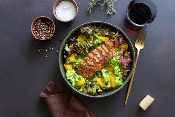 Salad with duck, oranges and nuts. Healthy eating. Diet.