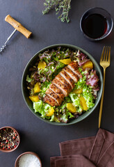 Salad with duck, oranges and nuts. Healthy eating. Diet.