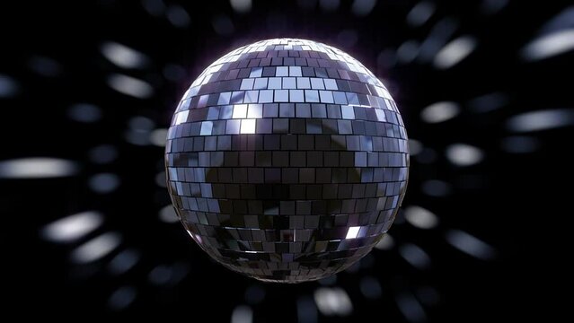 Disco Ball Background. This stock motion graphics clip shows a disco ball shimmering and rotating on a loop. 