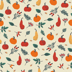 Seamless pattern with pumpkins, berries and leaves on orange background. Thanksgiving Day concept. For wrapping paper and other design projects