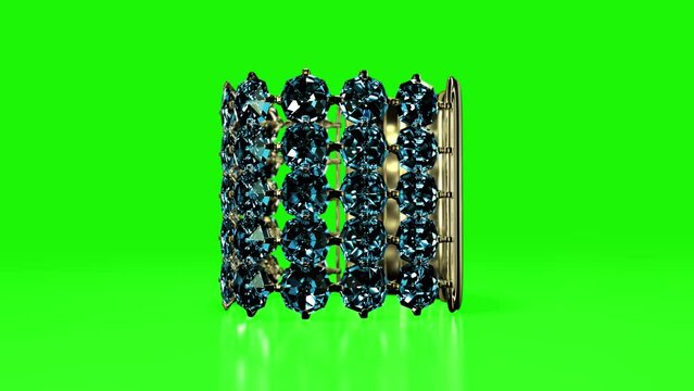 gold wristlet with topaz gem stones rotate on chroma key screen, isolated, fictive - loop video