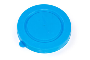 Blue plastic lid for glass jars on a white background
