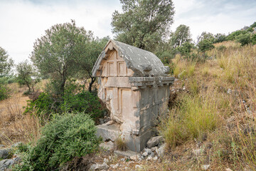 Xanthos, which was the capital of ancient Lycia, illustrates the blending of Lycian traditions especially in its funerary art. The rock-cut tombs, pillar tombs and pillar-mounted sarcophagi are unique