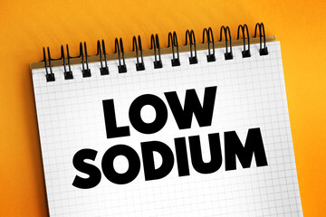 Low Sodium text on notepad, medical concept background