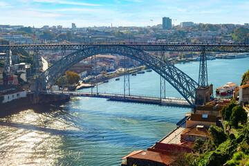 Fototapeta na wymiar Dom Luis bridge cityscape Porto