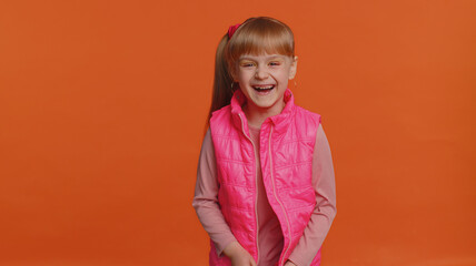 Joyful girl laughing out loud after hearing ridiculous anecdote, funny joke, feeling carefree...