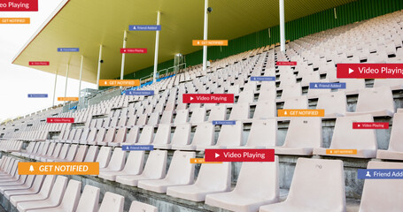 Image of social media icons on banners over empty stands in sports stadium