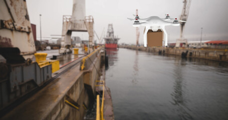 Drone carrying a box in a port