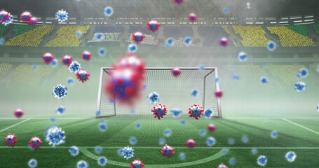 Image of covid 19 cells over brazilian flag in empty sports stadium