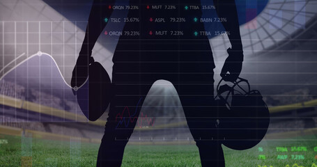 Image of graphs and data processing over midsection of american football player at stadium