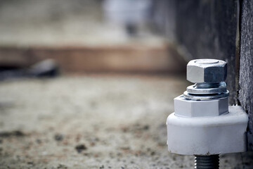 Railway track with nuts and bolts on a construction site.