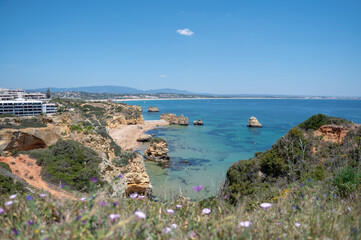 Fototapeta na wymiar Panorama of the tourist Praia de Dona Ana de Lagos in the Algarve, Portugal in the summer of 2022