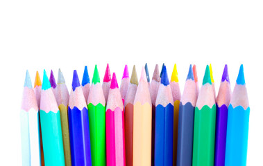 colored pencils lined on a white background