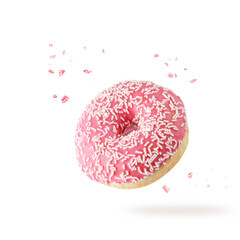 Pink glazed single donut with white sprinkles and crumbs flying on white.