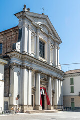 Fototapeta na wymiar Façade of the church of Saint Benedict, built in the 17th century in Baroque style, in Garibaldi square, Crema city center, province of Cremona, Lombardy region, Italy