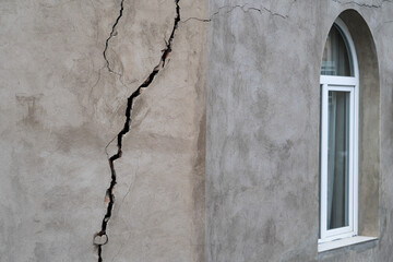 Closeup of cracked wall of house destroyed during strong earthquake in Tbilisi Georgia. Damage on...